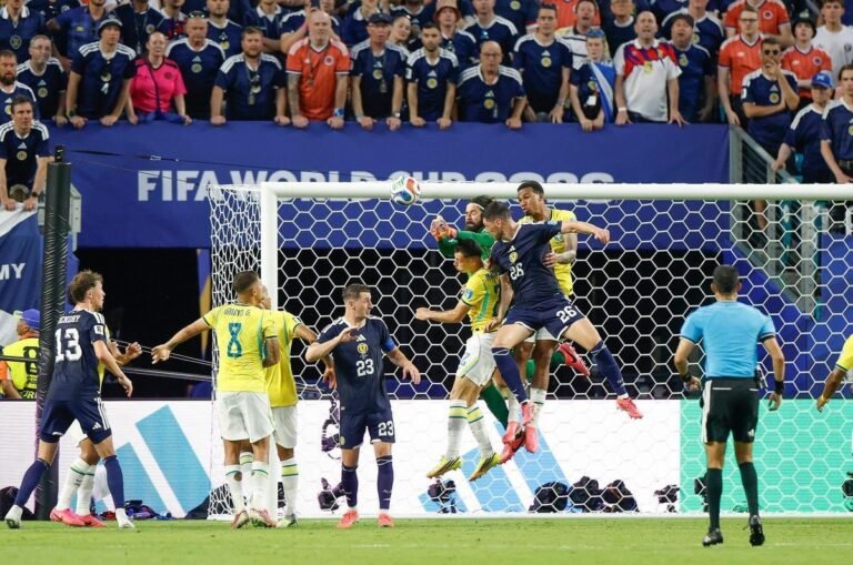 Alisson clears a threat from Scotland during a World Cup group stage match against the Brazil national team in Miami. Credits: Rafael Ribeiro/CBF