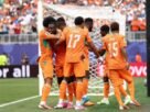 Ivory Coast players celebrate a goal — Photo: Darrian Traynor/Getty Images/AFP