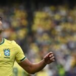 Casemiro celebrates Brazil's first goal of the match. Photo: Paul ELLIS / AFP