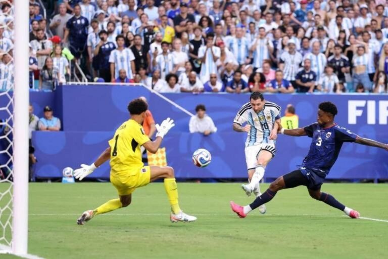 Messi beats goalkeeper Vozinha to score against Cape Verde in Argentina's 3-2 victory in the World Cup Round of 32 – Darrian Traynor/Getty Images via AFP